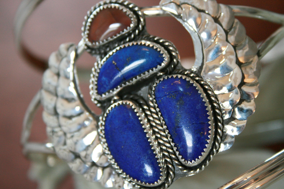 Scarab Detail image of a lapis and red rhodochrosite scarab armband in silver.